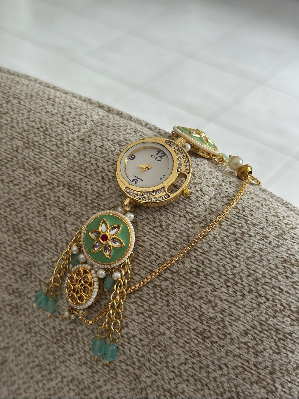Gold-Tone Women's Bracelet Watch with Green Enamel Accents